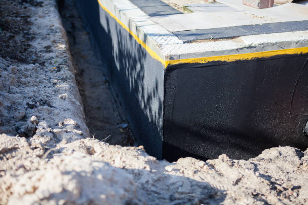 Professional Waterproofing technician working in Wayne, MI